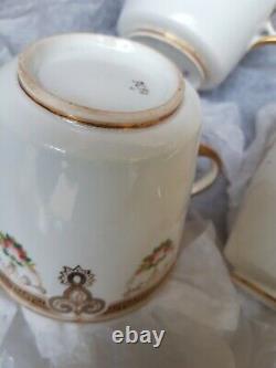 Rare Vintage Porcelain cups x12 and saucers X 5 white with gold and pink flower