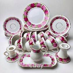 Reine Handarbeit 30 piece porcelain teaset. Cabbage Roses Dresden Germany