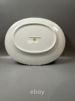 Set of classic Noritake P589 dinner ware for six white with gold rim and gold
