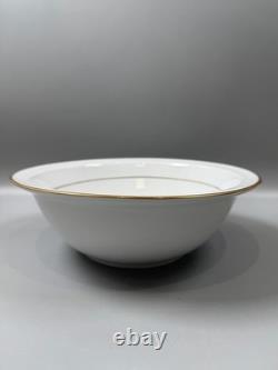 Set of classic Noritake P589 dinner ware for six white with gold rim and gold
