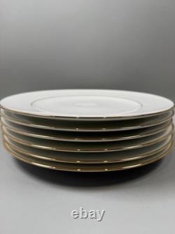Set of classic Noritake P589 dinner ware for six white with gold rim and gold