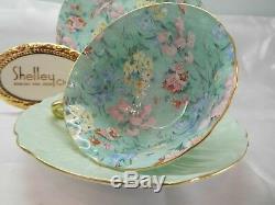 Shelley MELODY CHINTZ FOOTED OLEANDER CUP, SAUCER AND 7 PLATE GOLD TRIM