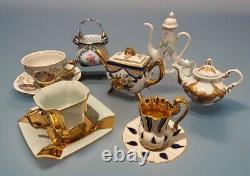 Small VTG Tea Set of Cups With Saucer Teapot with Gold Rim