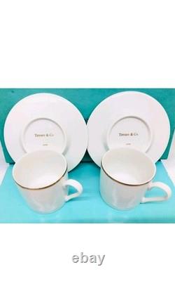 Tiffany & Co. Gold Band Pair of tea Demitasse cup & Saucers white