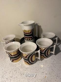 Vintage Coffee Cups, saucers and cream jug. Spare saucer and coffee pot lid