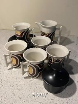 Vintage Coffee Cups, saucers and cream jug. Spare saucer and coffee pot lid