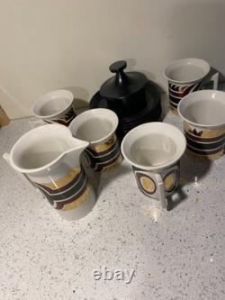 Vintage Coffee Cups, saucers and cream jug. Spare saucer and coffee pot lid